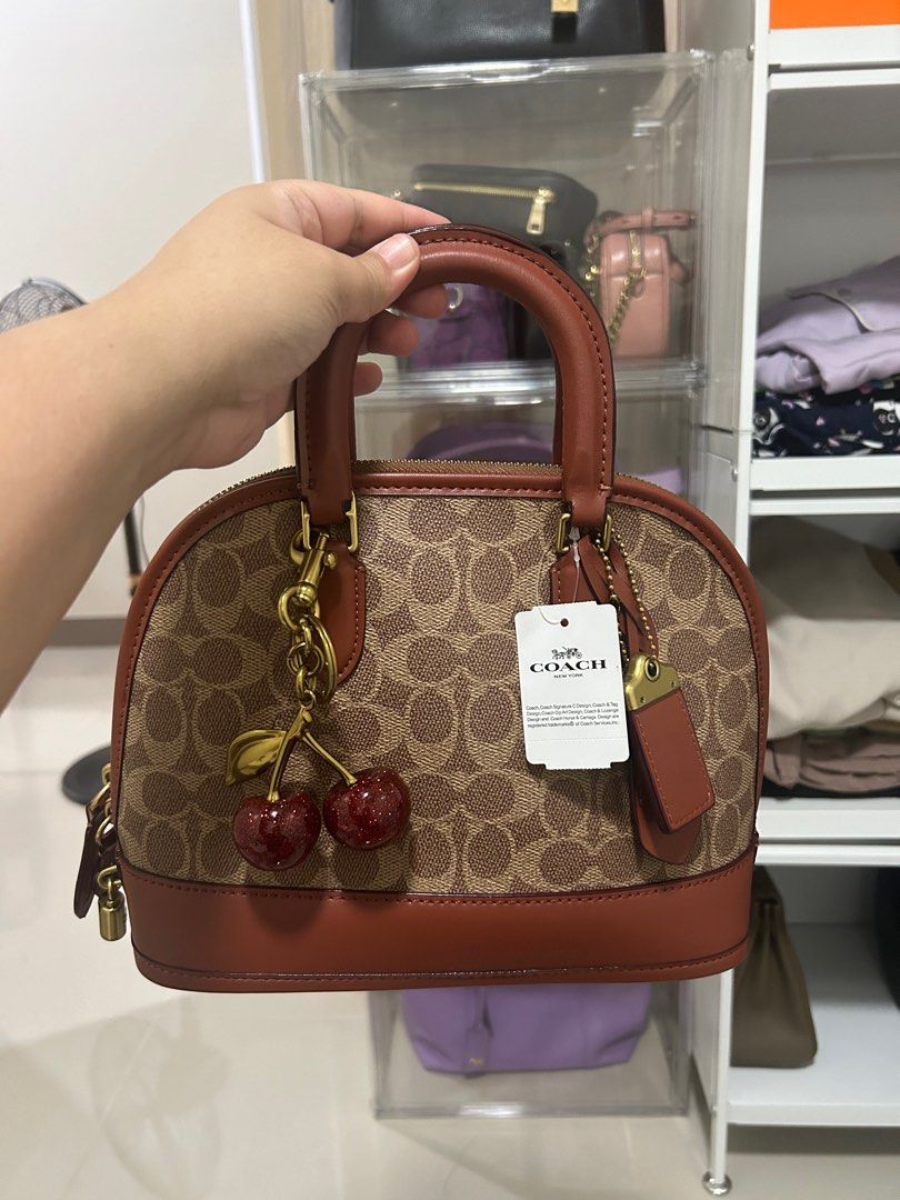 Coach Revel Bag (Category: Luxury Bags & Wallets) located in Bocaue. Submitted by bagbliss2024 (Listing ID 1321656898, Image 1). Description: Last price posted!! Original! With dustbag and tag. Will include cherry charm for free (not original choach charm) Only available for lalamove or pickup.