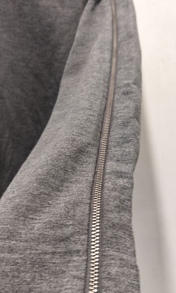 COS zipped detail turtleneck (Category: Longsleeves) located in Quezon City. Submitted by sicnarf_95 (Listing ID 1321744963, Image 2). Description: COS zipped turtleneck zip runs from the neck all the way to the end of the left sleeve tagged size 34 shoulders: 16" sleeve length: 22.5" pit to pit: 20" length: 22.5".