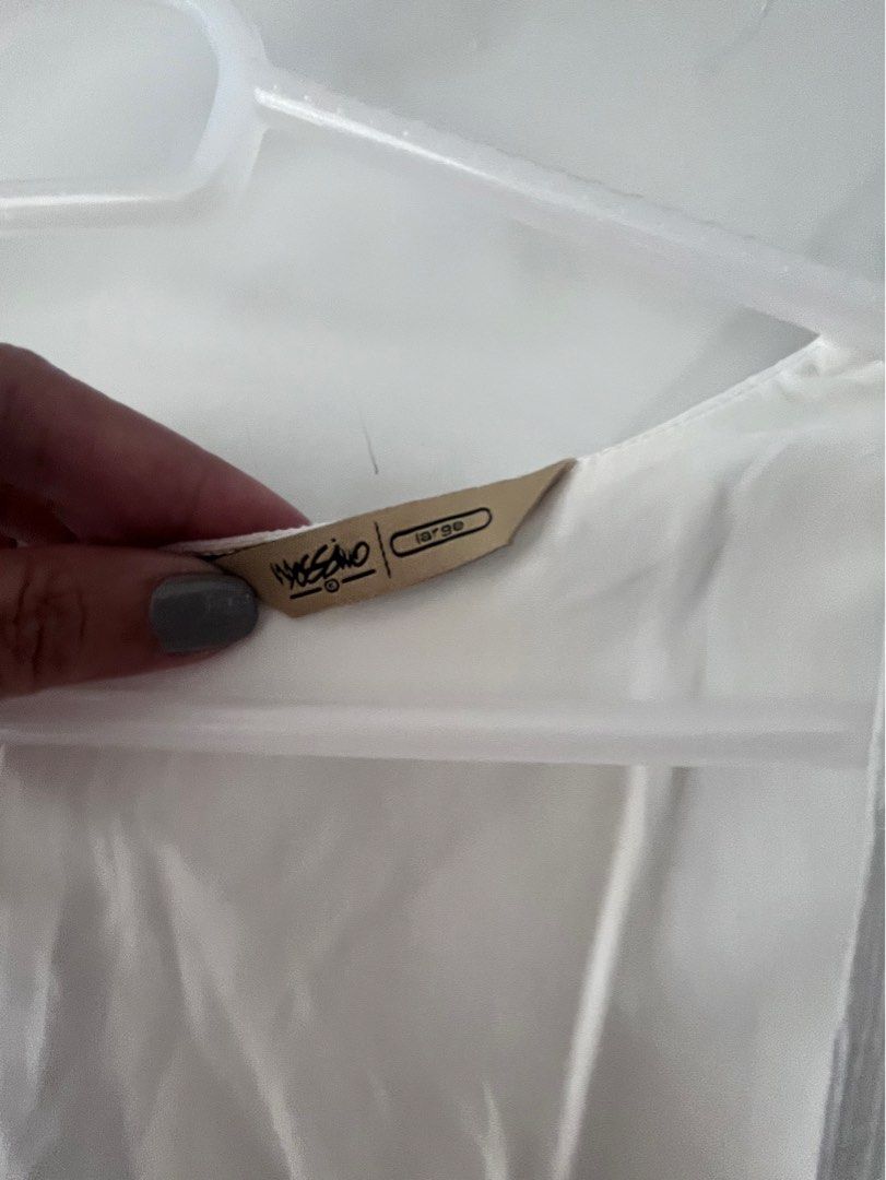 Mossimo short dress WHT L (Category: Dresses) located in Mandaluyong City. Submitted by fringed (Listing ID 1321723875, Image 3). Description: Just used once as shown in picture . No issue.