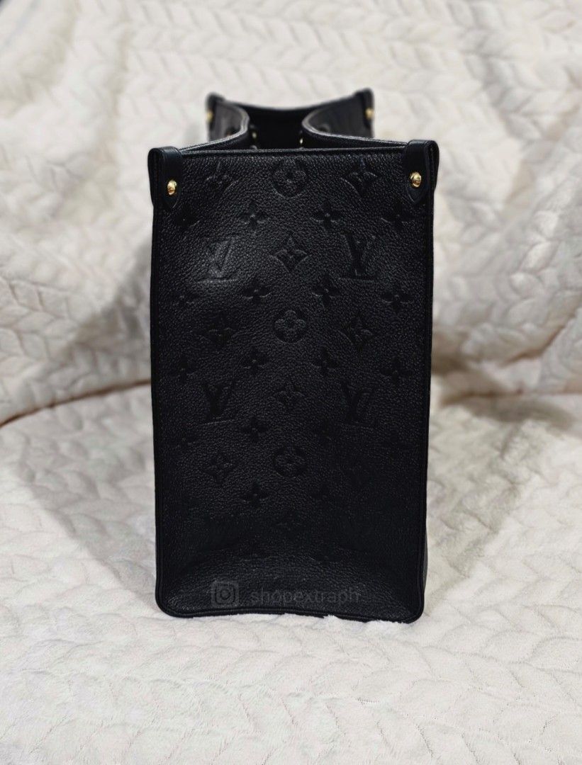 Louis Vuitton On the Go MM Empreinte (Category: Luxury Bags & Wallets) located in Paranaque City. Submitted by shopextraph (Listing ID 1215921004, Image 2). Description: Onthego MM tote bag in grained Monogram Empreinte, a soft leather that is embossed with a large and modern Monogram pattern. Thanks to the square shape, it boasts a generous capacity and can easily fit a laptop (up to 13"). Its articulated top handles and shoulder straps give car