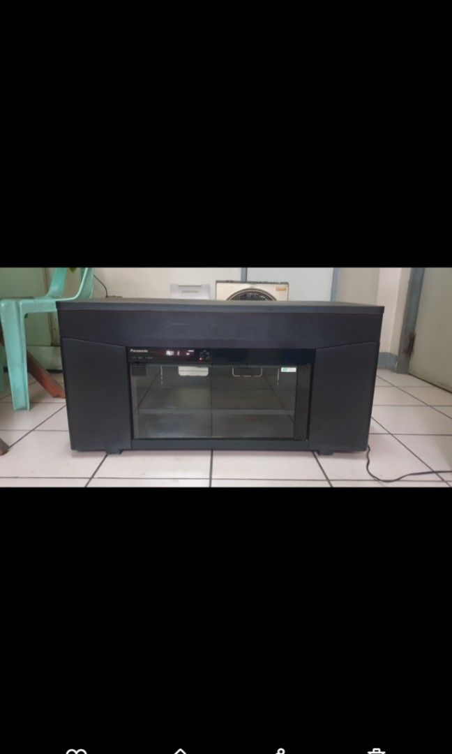 Panasonic Home Theather TV Rack (Category: Soundbars, Speakers & Amplifiers) located in Manila. Submitted by zandre615 (Listing ID 1321714510, Image 3). Description: Panasonic TV rack with build in amplifier and speakers In good working condition L 34 W 15.5 H 17 inches 100V AC Add shipping.