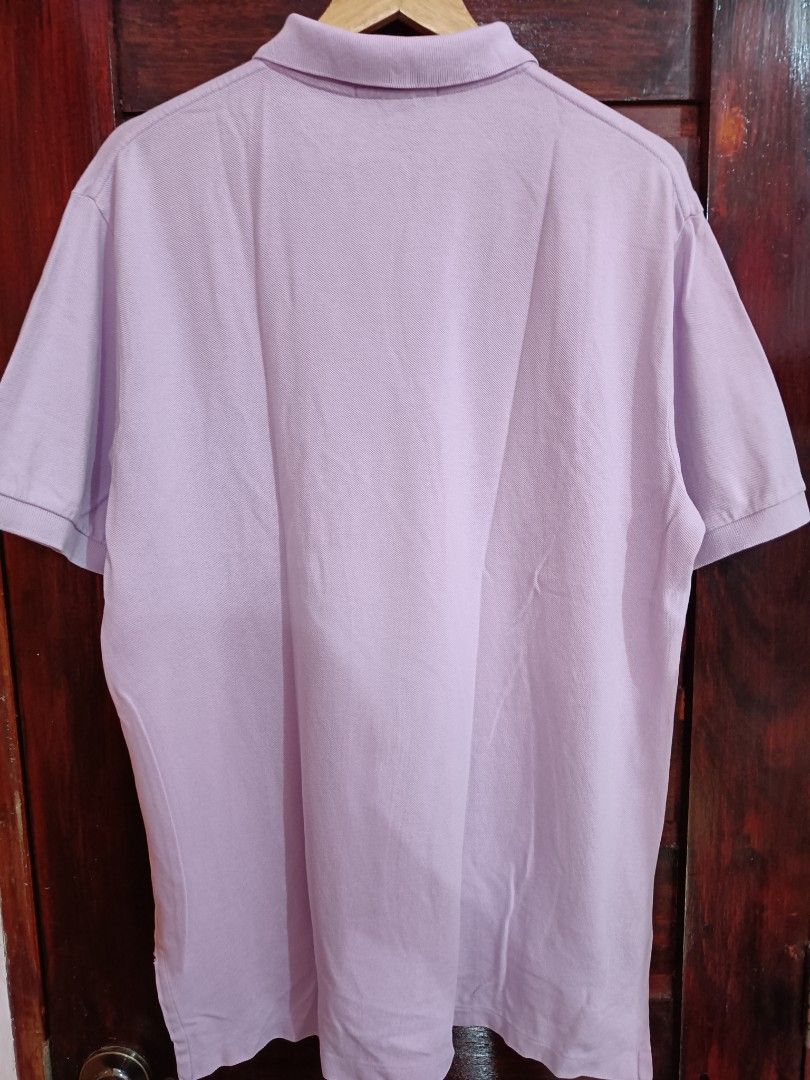Ralph Lauren polo shirt (Category: Tshirts & Polo Shirts ) located in Caloocan City. Submitted by hashibiraaaa (Listing ID 1321732962, Image 2). Description: 22x29-31(longback) Color rate 9/10 Light purple Issue slits and minimal stain in under arm.