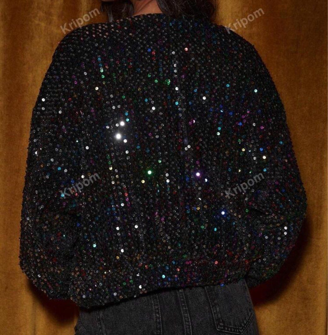 Sequin Jacket (Category: Coats, Jackets and Outerwear) located in Singapore. Submitted by eejay (Listing ID 1321769602, Image 2). Description: Size S Black jacket with rainbow sequins Very beautiful in person, especially worn at night, and events. Worn only once for D&D, in very good, like new, condition. Fabric is soft and slightly stretchy. There is Inner lining, so very comfortable when worn Meet up location is negotiable .