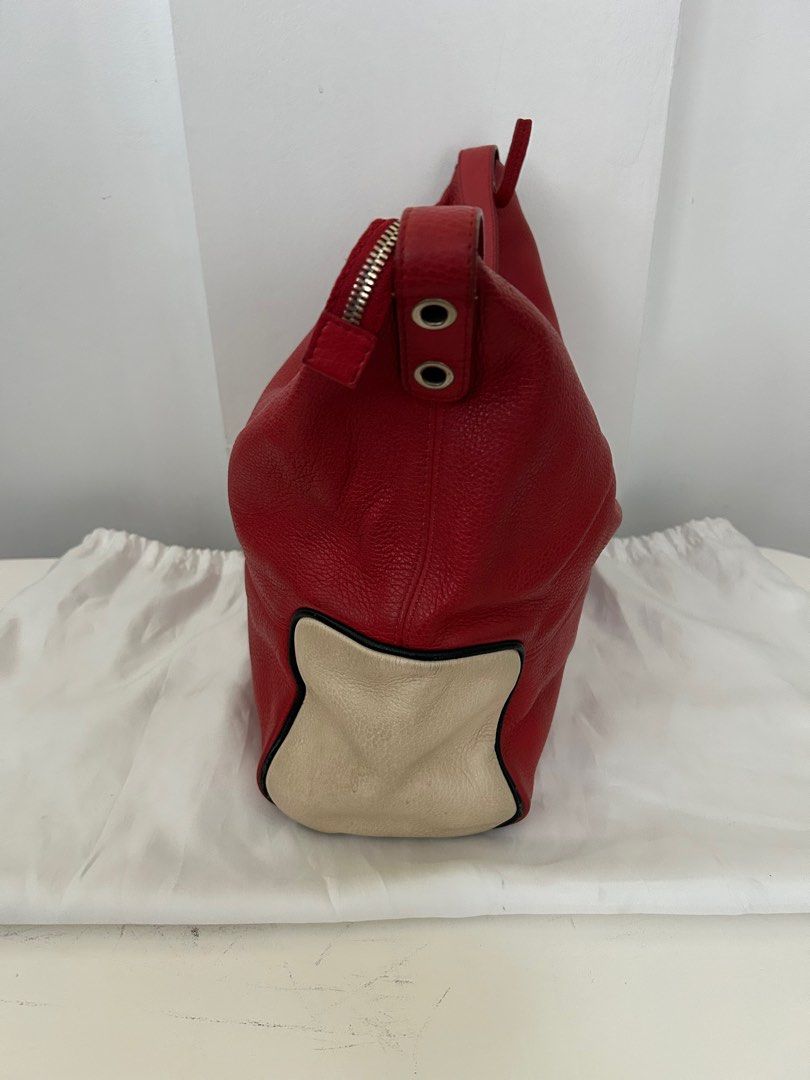 Shoulder bag (Category: Luxury Bags & Wallets) located in Quezon City. Submitted by bagsandstuffhub (Listing ID 1321723503, Image 3). Description: Red orange with white accent Genuine leather Large .
