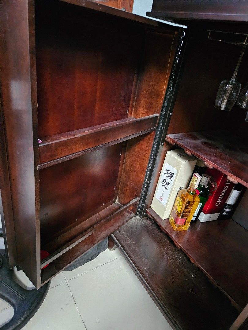 Super Sale Final Price: U.S. made Bar Cabinet with chiller 110v selling as is(pls see details) (Category: Shelves, Cabinets & Racks) located in Pasig City. Submitted by davedeleon (Listing ID 1321673380, Image 2). Description: - solid wood U.S. made quality - color dark mahogany - has a wine chiller ref 110v but needs repair - granite top - dimensions W 46" x D 24" x H 41" - fixed price excludes SF location: pasig near ayala mall feliz marcos hiw