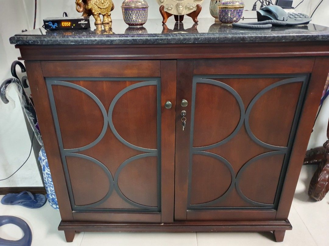 Super Sale Final Price: U.S. made Bar Cabinet with chiller 110v selling as is(pls see details) (Category: Shelves, Cabinets & Racks) located in Pasig City. Submitted by davedeleon (Listing ID 1321673380, Image 1). Description: - solid wood U.S. made quality - color dark mahogany - has a wine chiller ref 110v but needs repair - granite top - dimensions W 46" x D 24" x H 41" - fixed price excludes SF location: pasig near ayala mall feliz marcos hiw