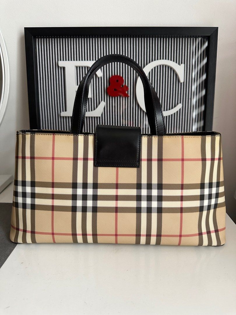 💯Authentic Burberry Handbag (Fixed Price) (Category: Luxury Bags & Wallets) located in Quezon City. Submitted by _anythingforless_ (Listing ID 1321837277, Image 2). Description: Available!! Actual photos posted including length and height In very good condition, no major flaws or scuffings No inclusions Priced is fixed Shipping from fairview, qc c/o buyer .