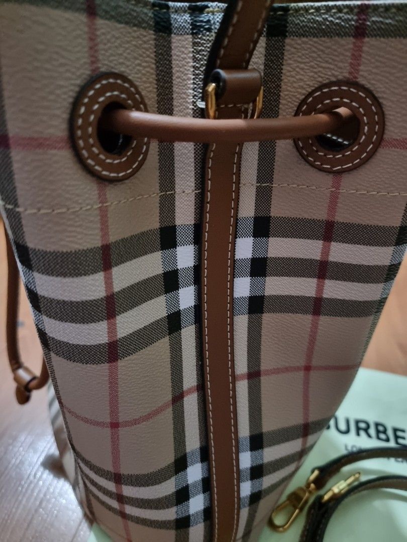 Burberry bucket bag (Category: Luxury Bags & Wallets) located in Las Pinas. Submitted by luxeprelovedstuff (Listing ID 1321885842, Image 3). Description: brandnew never used burberry bucket beige/briar brown with sling with dustbag only korea source.