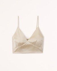 Champagne Cream Satin Crop Top (Category: Others Tops) located in Muntinlupa City. Submitted by bznic (Listing ID 1306152038, Image 2). Description: Washed but never used. Adjustable straps. Also available in Chocolate Espresso and Olive Green.