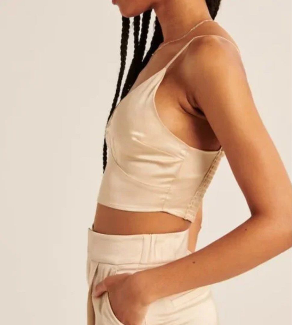 Champagne Cream Satin Crop Top (Category: Others Tops) located in Muntinlupa City. Submitted by bznic (Listing ID 1306152038, Image 3). Description: Washed but never used. Adjustable straps. Also available in Chocolate Espresso and Olive Green.