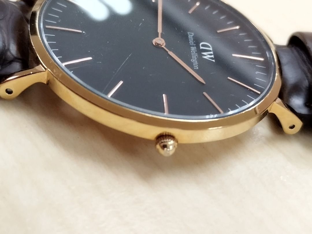 Daniel wellington black and gold on sale