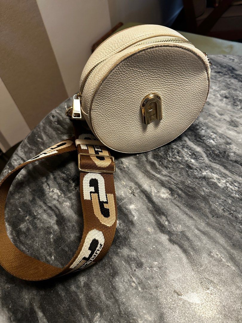 Furla sleek mini round crossbody bag 2025