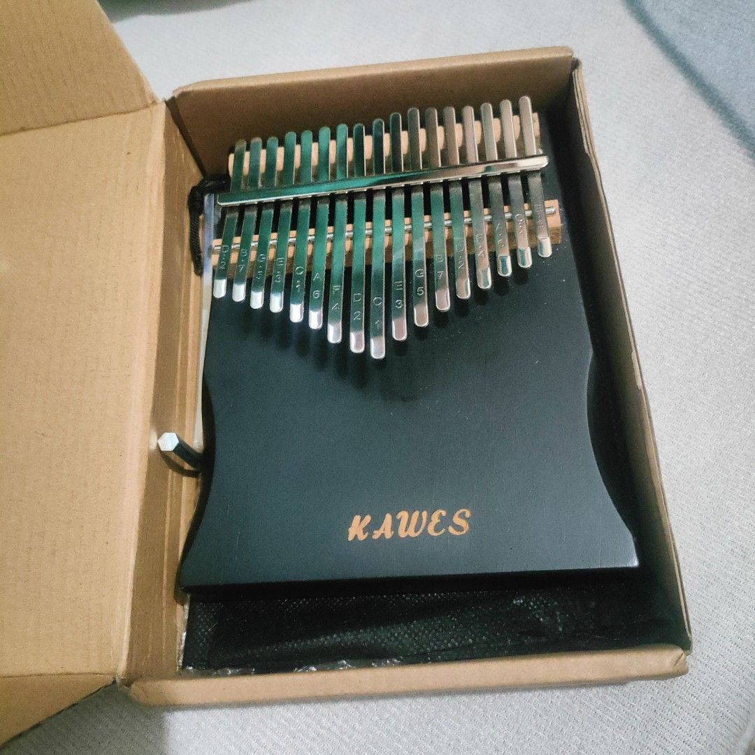 Kawes Kalimba (Category: Musical Instruments) located in Pateros City. Submitted by chooeyble (Listing ID 1321952861, Image 3). Description: I'm selling my Kawes Kalimba with pouch and box. good condition. Contact: 09101653177 Open for meet-up: Pasig San Joaquin or Pateros.