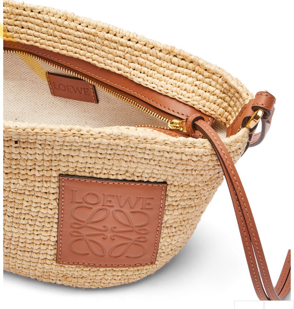 Loewe Pochette in Raffia (Category: Luxury Bags & Wallets) located in Taguig. Submitted by sourcedbym (Listing ID 1322012728, Image 2). Description: New! Comes complete with dustbag and cards Fresh from Spain Arrives Sept 10.