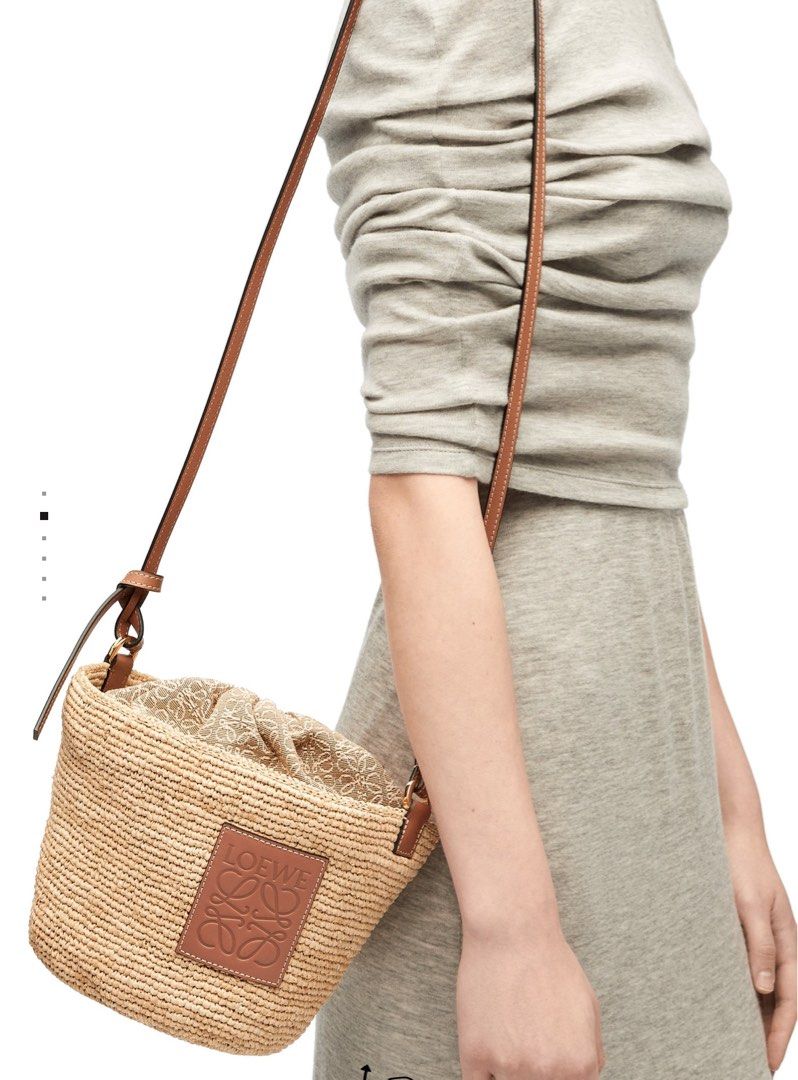 Loewe Pochette in Raffia (Category: Luxury Bags & Wallets) located in Taguig. Submitted by sourcedbym (Listing ID 1322012728, Image 1). Description: New! Comes complete with dustbag and cards Fresh from Spain Arrives Sept 10.