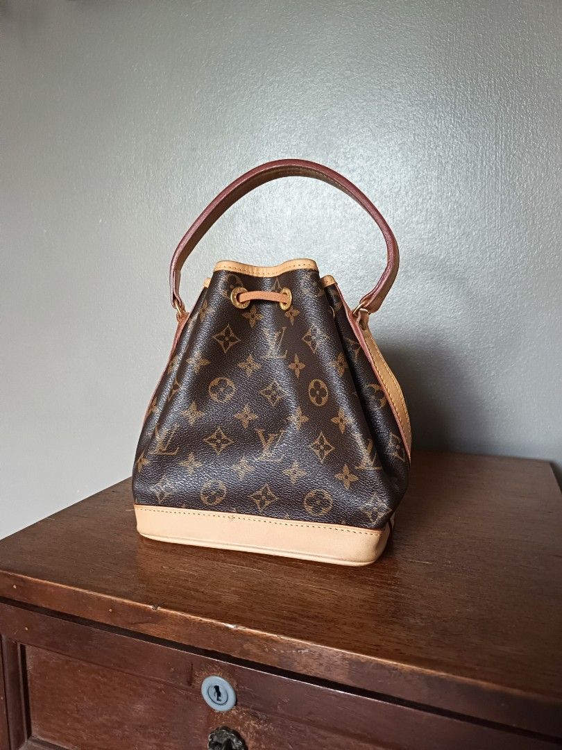 Louis Vuitton mini noe bucket bag sling (Category: Luxury Bags & Wallets) located in Manila. Submitted by materialgirl123 (Listing ID 1321904493, Image 2). Description: LV mini noe for sale classic monogram & genuine vachetta leather in almost new condition, vachetta has super light patina, no big stains can't find a date code on this but the stamps are all very nicely done! got this from an ukay reseller, very nice quality just like the boutique