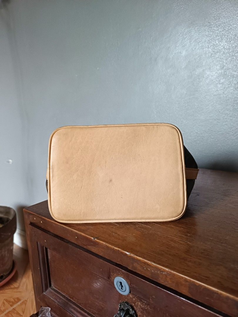 Louis Vuitton mini noe bucket bag sling (Category: Luxury Bags & Wallets) located in Manila. Submitted by materialgirl123 (Listing ID 1321904493, Image 3). Description: LV mini noe for sale classic monogram & genuine vachetta leather in almost new condition, vachetta has super light patina, no big stains can't find a date code on this but the stamps are all very nicely done! got this from an ukay reseller, very nice quality just like the boutique