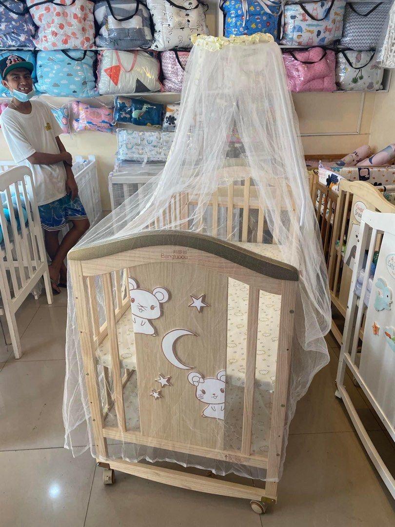 Multifunctional natural pinewood imported crib (Category: Cots & Cribs) located in Pasig City. Submitted by czyzabbabyneeds (Listing ID 1321941105, Image 2). Description: Multifunctional newzealand pinewood crib 10in1 Rocking crib Changing pad Adjustable Playpen Single bed Storage Dropside Inclusions: 10in1 natural crib gold on top Free mattress Free mosquito net stand Free shipping & cod around metro manila only Price :8,000 only ‼️ Store locati