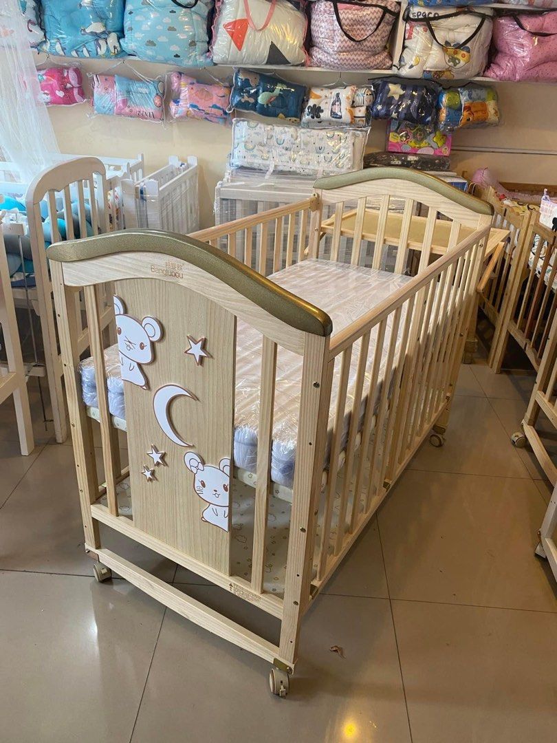 Multifunctional natural pinewood imported crib (Category: Cots & Cribs) located in Pasig City. Submitted by czyzabbabyneeds (Listing ID 1321941105, Image 3). Description: Multifunctional newzealand pinewood crib 10in1 Rocking crib Changing pad Adjustable Playpen Single bed Storage Dropside Inclusions: 10in1 natural crib gold on top Free mattress Free mosquito net stand Free shipping & cod around metro manila only Price :8,000 only ‼️ Store locati