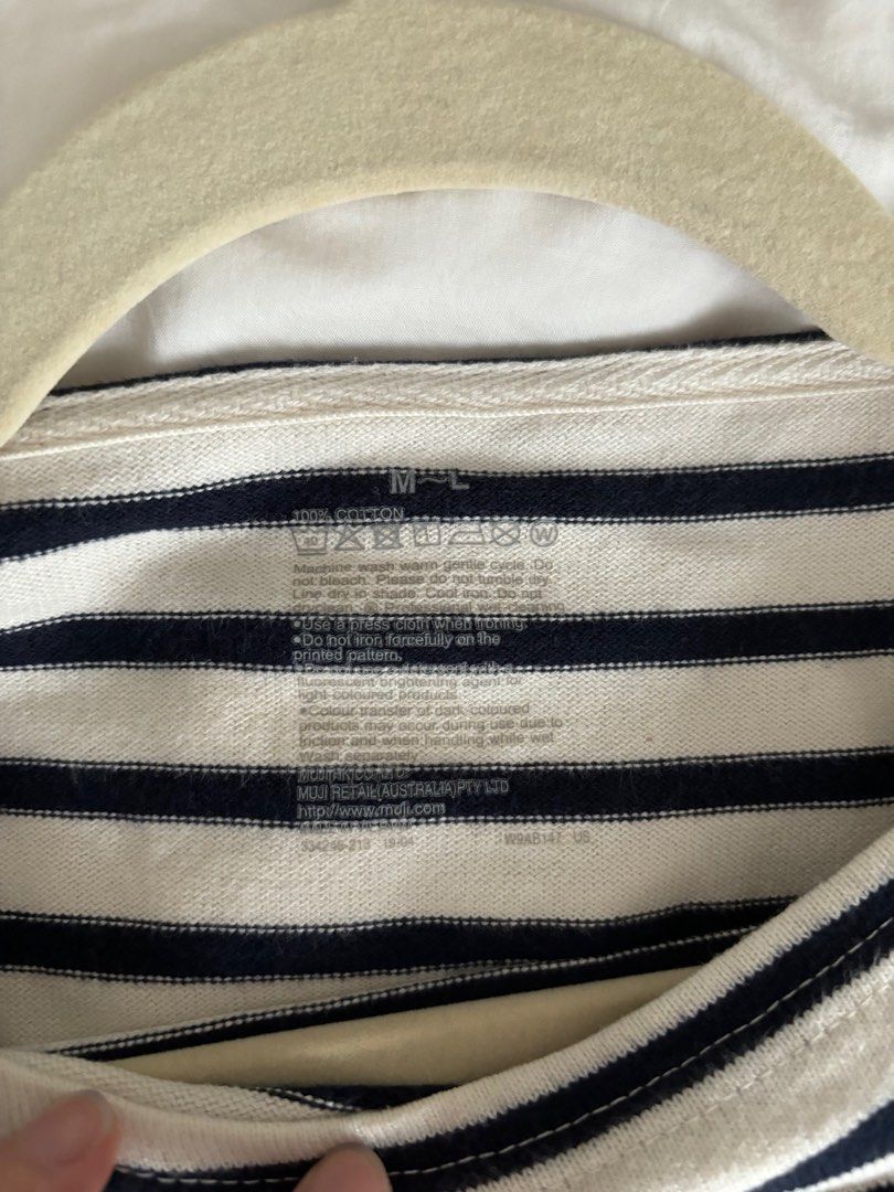 Navy and white striped top | Muji (Category: Longsleeves) located in Makati City. Submitted by geministyle (Listing ID 1321926759, Image 3). Description: Navy striped top from Muji. 3/4 length sleeves. Used but in good condition..