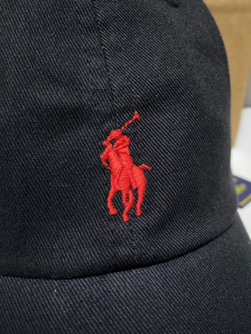 Black polo hat with red horse top