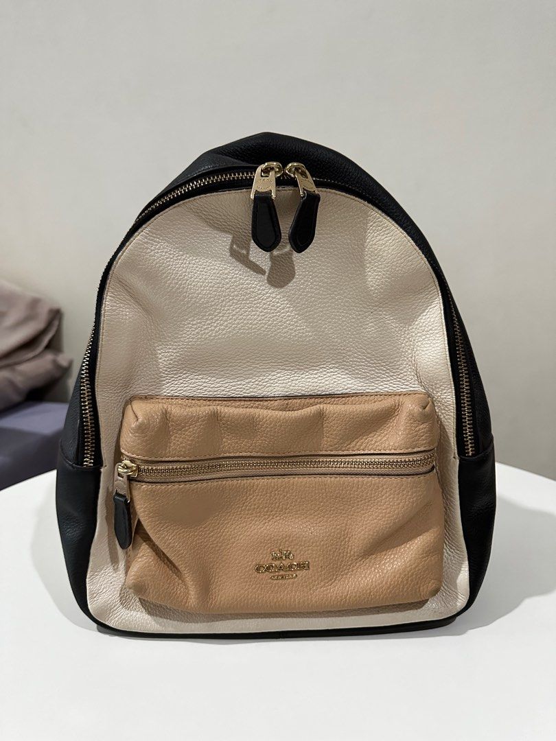 Preloved Coach (Category: Luxury Bags & Wallets) located in Taguig. Submitted by jevousvois (Listing ID 1321963290, Image 1). Description: Preloved Original Coach Backpack - Creasing on sides are due to improper storage - Leather on tag is starting to peel off - Size Medium Nego for sure buyer Loc: Bacolod City.