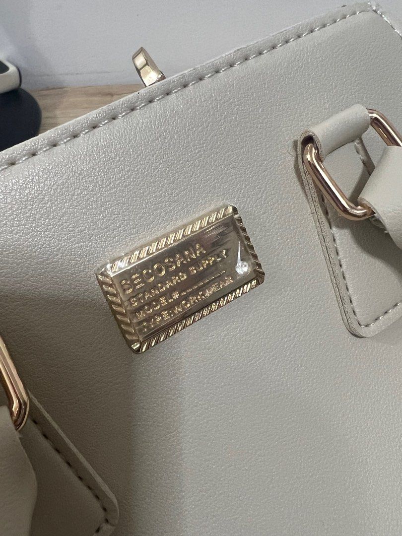 Secosana Shoulder/Hand Bag (Category: Shoulder Bags) located in Manila. Submitted by chaeri_____ (Listing ID 1321833884, Image 2). Description: — slightly nego — never been used — handware has plastic pa, see photo — flawless condition — dust bag.