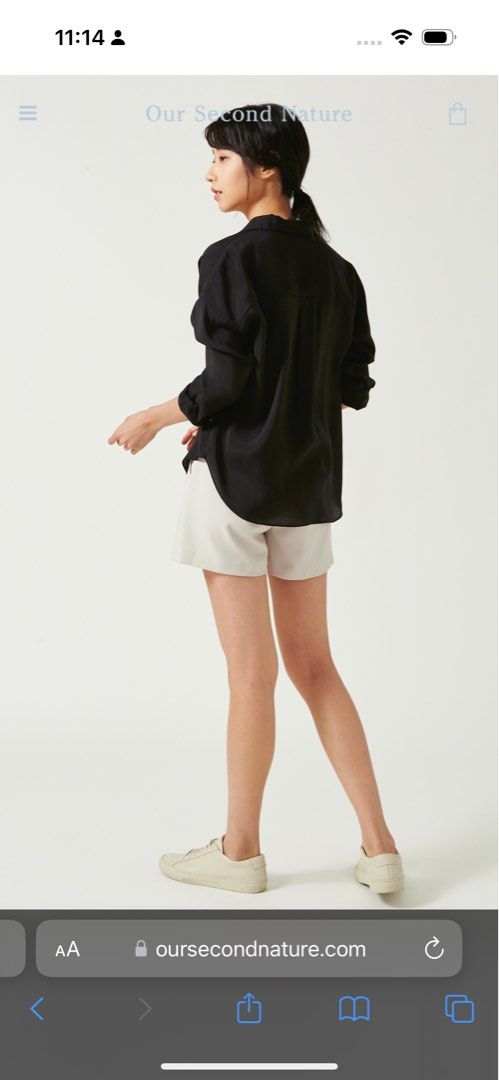 OSN Tencel Button Down Shirt - black (Category: Blouses) located in Singapore. Submitted by movingoutsale.relocate (Listing ID 1321986222, Image 3). Description: Worn twice. In excellent condition. Lightweight material, great for summer weather. Doesn’t crumple easily and looks effortlessly polished. Selling as this size no longer fits me. .
