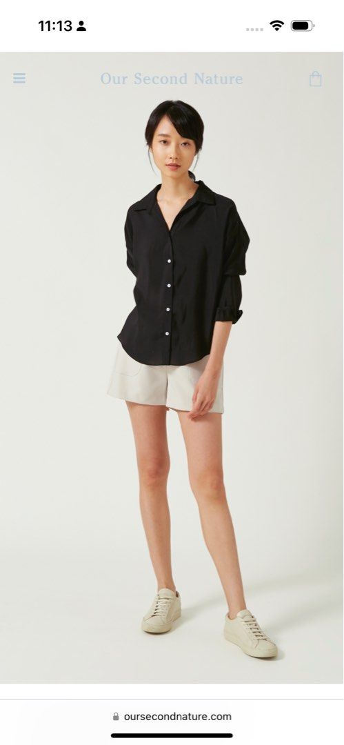 OSN Tencel Button Down Shirt - black (Category: Blouses) located in Singapore. Submitted by movingoutsale.relocate (Listing ID 1321986222, Image 2). Description: Worn twice. In excellent condition. Lightweight material, great for summer weather. Doesn’t crumple easily and looks effortlessly polished. Selling as this size no longer fits me. .