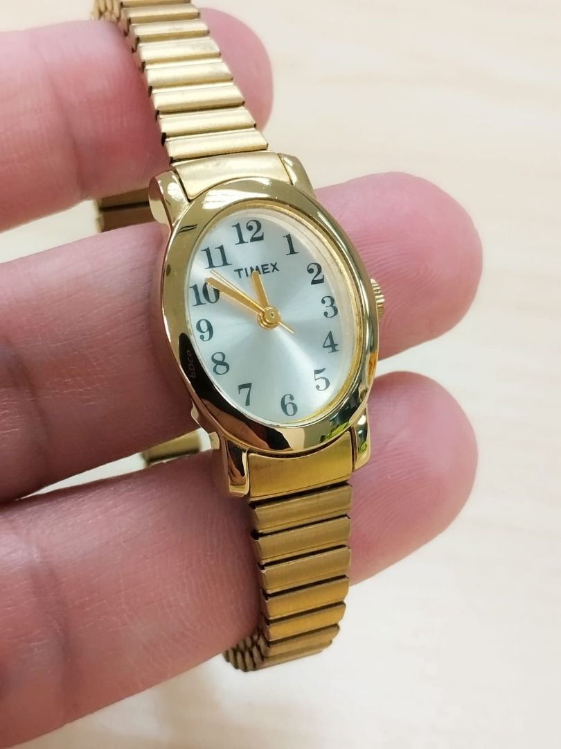 Timex Cavatina Gold Bezel Silver Dial Gold Expansion Band Stainless Steel SKU T21872 Retail 280 Women s Fashion Watches Accessories Watches on Carousell