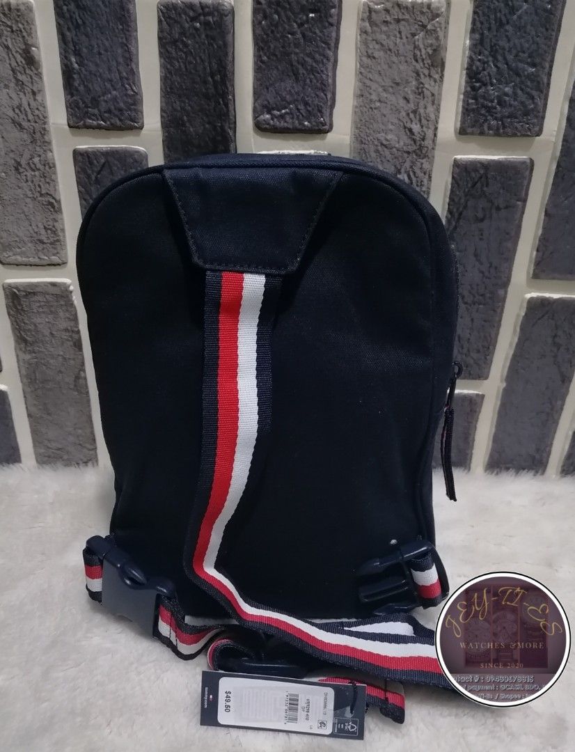 Tommy Hilfiger Crossbody Bag (Category: Sling Bags) located in Taytay. Submitted by jeyties (Listing ID 1321877729, Image 2). Description: Original Tommy Hilfiger Crossbody Bag Material : Textile/Nylon Strap 29cm height x 20cm width.