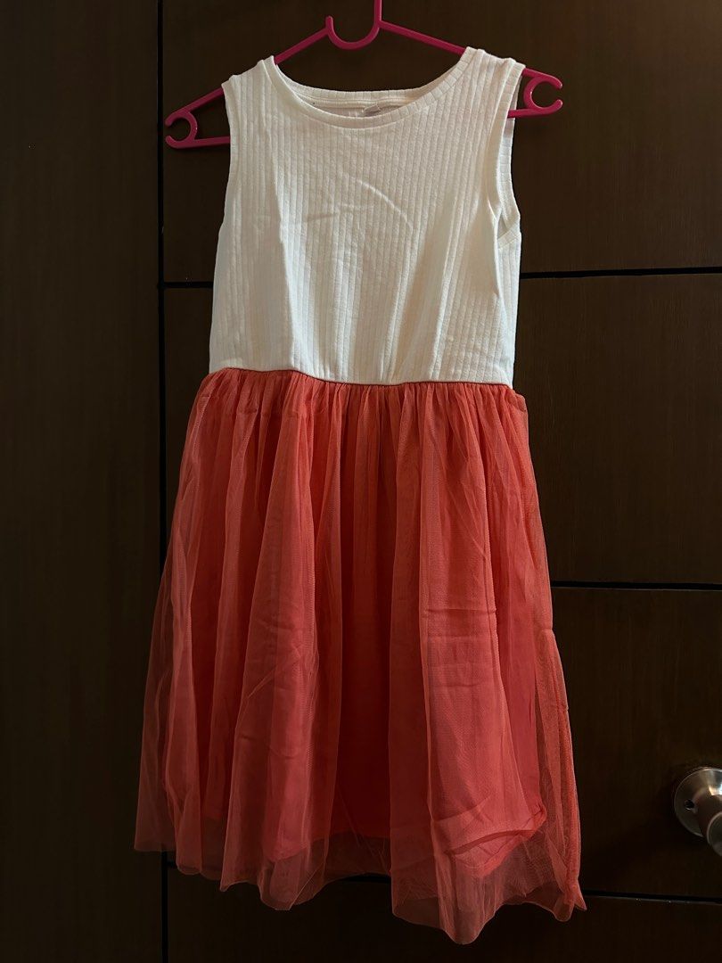 Uniqlo dress with tutu size 150 (Category: Babies & Kids Fashion) located in Manila. Submitted by trixiefaves (Listing ID 1321936021, Image 1). Description: Uniqlo dress with tutu size 150. Almost brand new. Never worn but washed. Length is 30” and width is 12”.