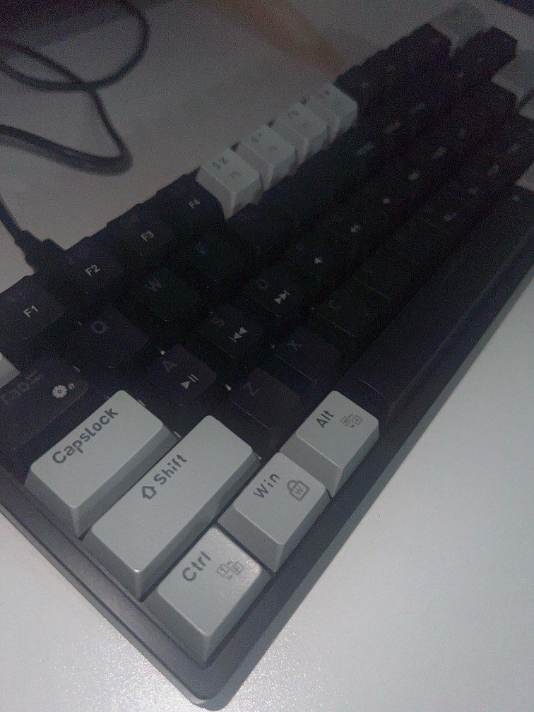 AULA F3261 Mechanical Keyboard (Category: Computer Keyboard) located in Cavite. Submitted by psycheoldnewstuff (Listing ID 1322194510, Image 2). Description: AULA F3261 Mechanical Keyboard - 61 Keys - Bought from the orange app - Grey black in color - Blue switch - Wired - Lightly used (female user).