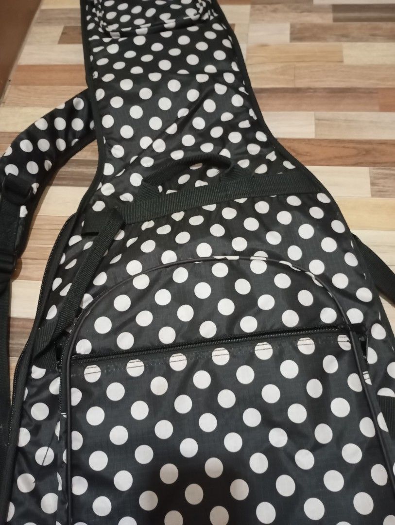 Bass Guitar Gig Bag (Category: Musical Instruments) located in Calamba. Submitted by householdistro (Listing ID 1322135514, Image 3). Description: Bass Guitar Gig Bag Polka Dots design W/ upper and lower pocket W/ 2 shoulder back strap Durable / Padded / Comfortable P1500 (aceepts gcash/maya/bpi/bdo) Location: Calamba City, Laguna.