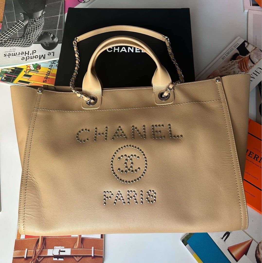 Chanel Deauville Tote beige Large (Category: Luxury Bags & Wallets) located in Quezon City. Submitted by luxuryamethystph (Listing ID 1322099249, Image 1). Description: Chanel Deauville Tote beige Large with authenticity card,dustbag.