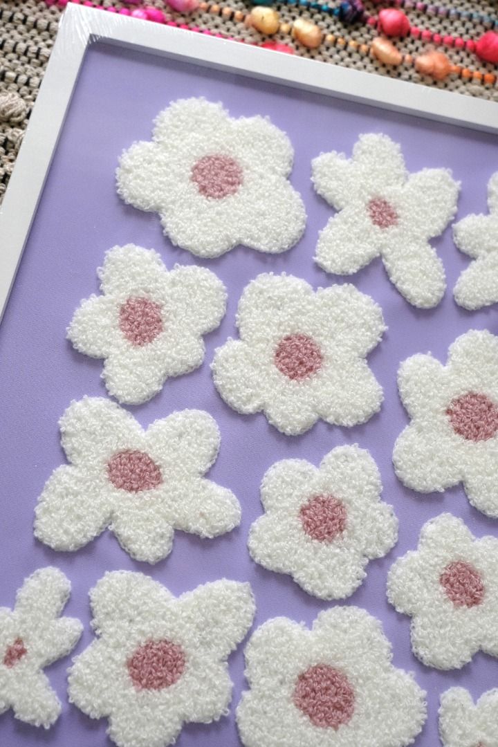 Cute Flowers Purple Tufted Wall Frame Decor (Category: Wall Decor) located in Rizal. Submitted by hazelco (Listing ID 1322100885, Image 3). Description: Add some floral accent to your space with this tufted wall decor 🌸💜 • Size: 12.20in (W) x 14.33in (L) • with back hook • includes Dottie Studio frosted ziplock ₱699.00 available for same day delivery 🛵 1pc available Location: Twin Oaks Place, Shaw Blvd., Mandaluyong City.