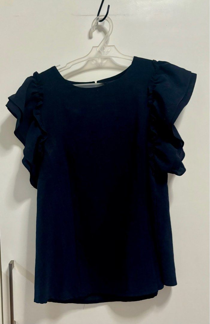 Dark blue blouse (Category: Blouses) located in Pasig City. Submitted by aac2021 (Listing ID 1322088680, Image 1). Description: RFS: Decluttering Dimension : Bustline - 35 inches Length - 23 inches Korean brand .