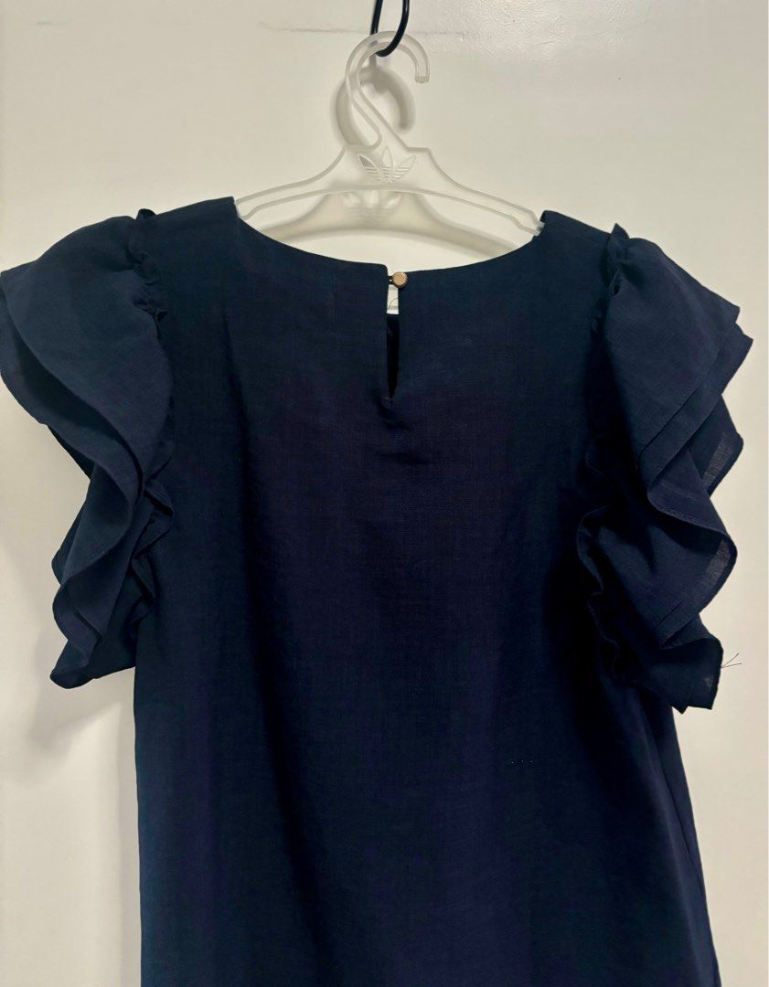 Dark blue blouse (Category: Blouses) located in Pasig City. Submitted by aac2021 (Listing ID 1322088680, Image 2). Description: RFS: Decluttering Dimension : Bustline - 35 inches Length - 23 inches Korean brand .