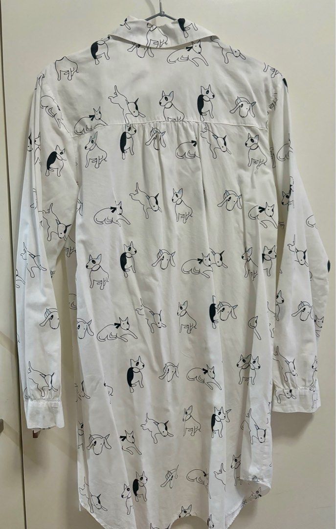 Dog print white longsleeves (Category: Longsleeves) located in Pasig City. Submitted by aac2021 (Listing ID 1322091386, Image 3). Description: RFS: Decluttering Dimension : Bustline - 40 inches Length - 32 inches .