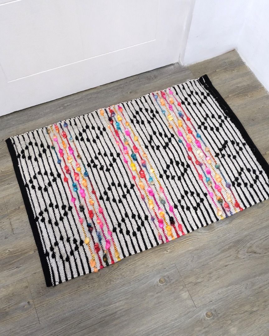 Dottie Studio Cute Boho Aztec Multicolor Accent Paddle Rug 24x36 (Category: Carpets, Mats & Flooring) located in Rizal. Submitted by hazelco (Listing ID 1322104233, Image 1). Description: Dottie Studio Room Decors Elevate your bedroom, office, bathroom & more with this boho inspired rug. • Boho Accent Paddle Rug • Size: 24in (W) x 36in (L) • Material: Cotton • Includes Dottie Studio frosted ziplock • Care Instructions: Machine wash cold. Gentle c