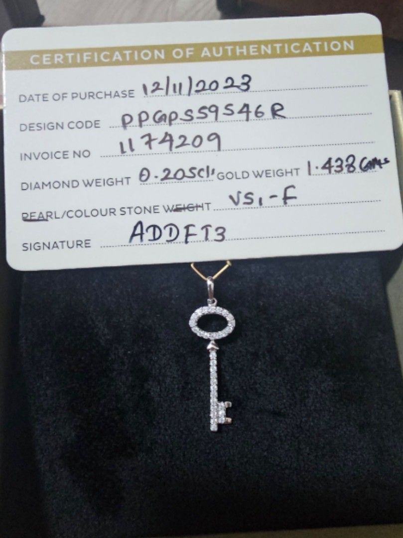 Key Diamond Pendant 18k White Gold (Category: Jewelry) located in Taguig. Submitted by riello (Listing ID 1322161023, Image 2). Description: Complete bought from Pure Gold Jewellers in Abu Dhabi Airport. Can pass for a gift. VS, F color, 0.20 total carat, 1.438 grams can be given as a gift. Box, dustbag, paperbag and certificate of authentication..