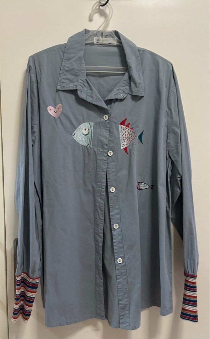Light denim blue longsleeves with embroidered design (Category: Longsleeves) located in Pasig City. Submitted by aac2021 (Listing ID 1322089465, Image 1). Description: RFS: Decluttering Dimension : Bustline - 42 inches Length - 26.5 inches Korean brand.