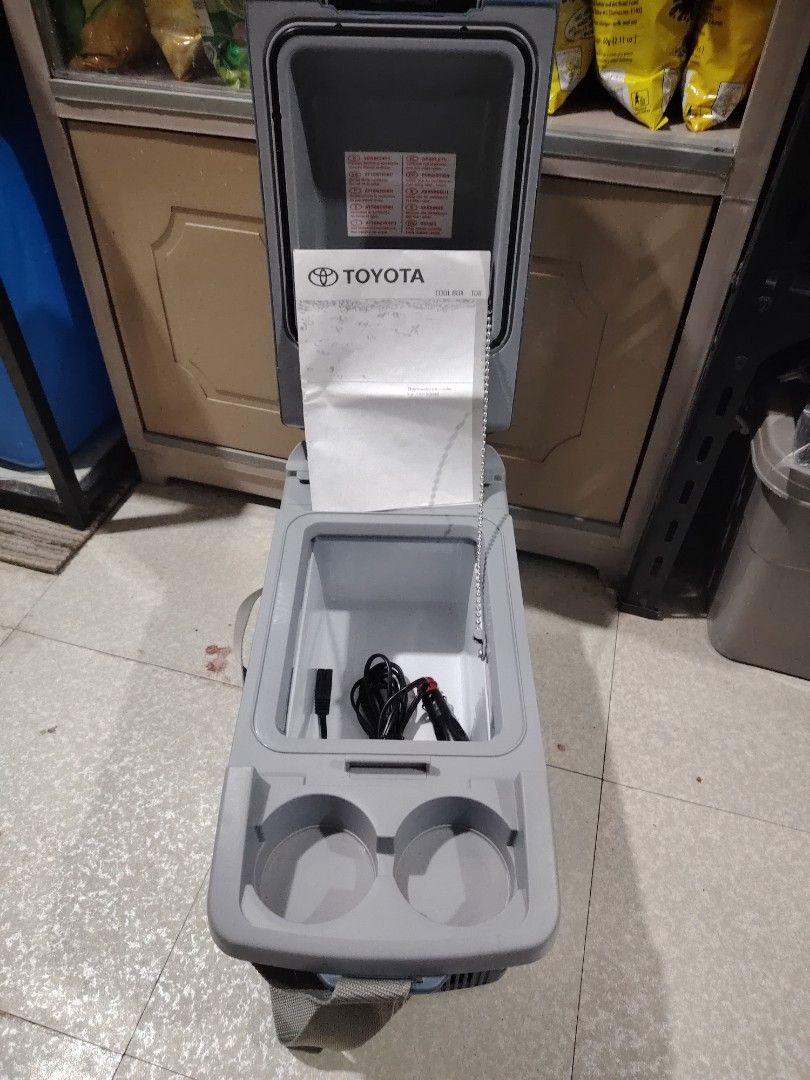 Original Toyota Cool Box Almost New (Category: Other Automotive Parts and Accessories) located in General Trias. Submitted by zarn28 (Listing ID 1322054672, Image 3). Description: For Sale Original Toyota Cool Box (Mini Cooler) for Cars connected to 12v ciggarette socket. Bago pa once lang ginamit with plastic pa..
