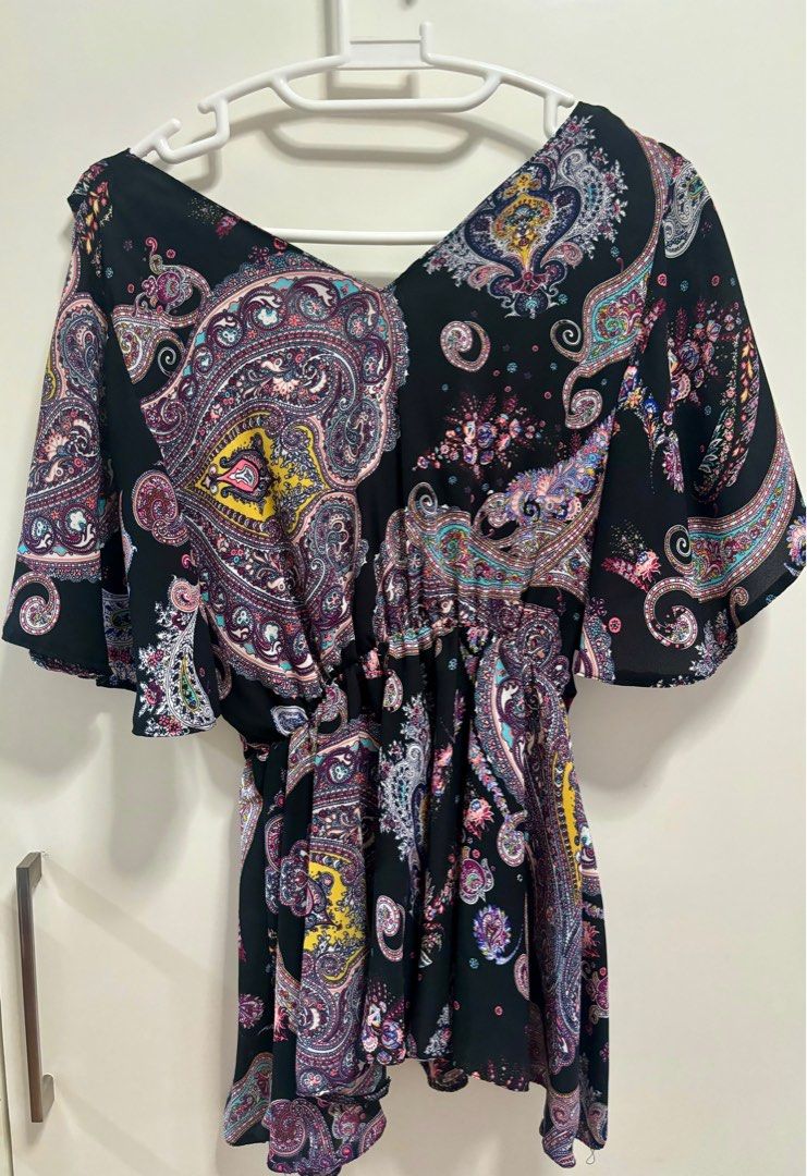Paisley Design Blouse (Category: Blouses) located in Pasig City. Submitted by aac2021 (Listing ID 1322086648, Image 2). Description: RFS: Decluttering Dimension : Bustline - 34-38 inches Waistline - 22-36 inches Length - 22 inches .
