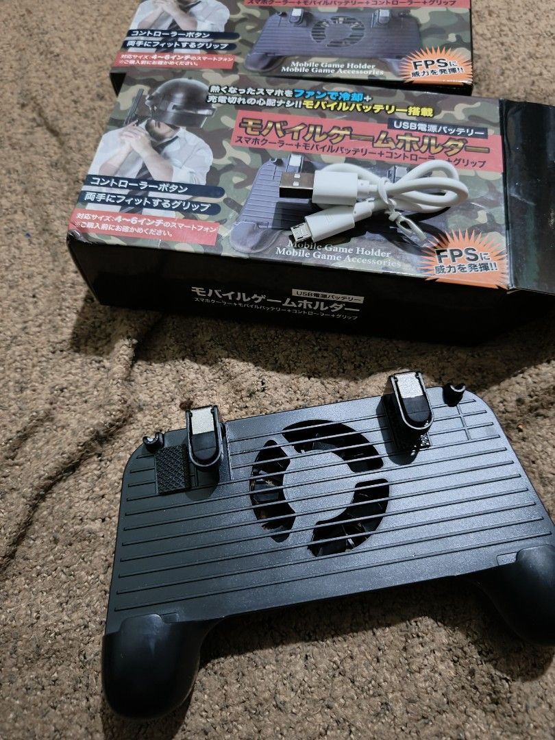 Pubg phone game controller holder (Category: Controllers) located in Quezon City. Submitted by markgolveo (Listing ID 1322140550, Image 1). Description: Pubg phone game controller holder bnew old stock from japan 250 each.