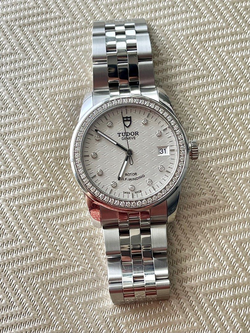 TUDOR Glamour Date with Diamonds (Category: Luxury Watches) located in Manila. Submitted by verashops (Listing ID 1321670385, Image 2). Description: Authentic Tudor Unisex Watch Tudor Glamour Date with Diamonds Complete Set with Box and Card, dated May 2024 A 36mm Glamour Date featuring a factory diamond-set bezel, a silver jacquard dial with diamond-set indices, a date at 3:00 and a multi-link steel bracelet with a signed deployant clasp. Origin