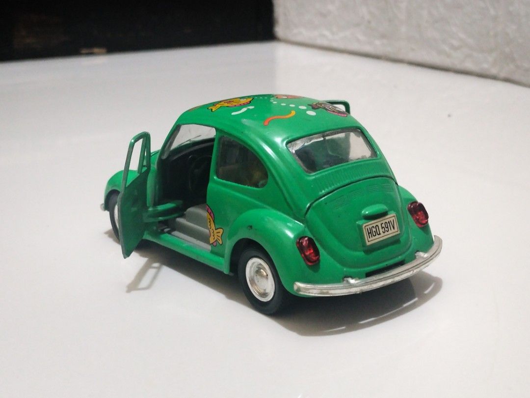 volkswagen beetle diecast toy car (Category: Vehicle & Diecast Models) located in Caloocan City. Submitted by m.hobby (Listing ID 1322202170, Image 3). Description: diecast volkswagen beetle toy car * mr.fish * ss5702 ( superior sunnyside ) * pull back action * doors and bonnet openable * check picture for details and size * free na ung yellow (funny beetles) as is. location: bagbaguin caloocan city mop: gcash price: 500+sf.