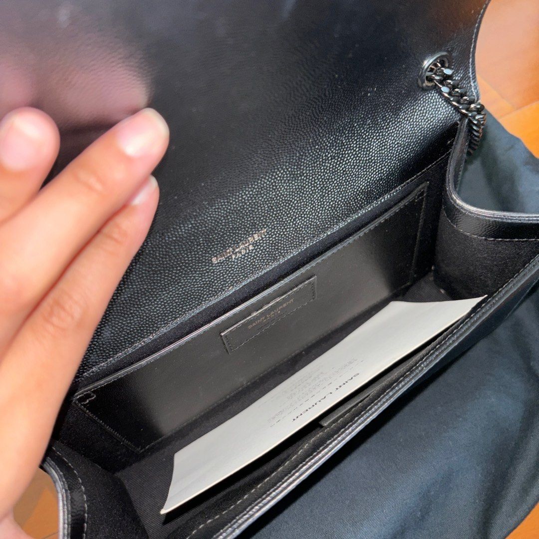 YSL Kate in Medium (Category: Luxury Bags & Wallets) located in Paranaque City. Submitted by booksandbeyond (Listing ID 1322122890, Image 2). Description: YSL Kate in medium all black -Condition 8.5/10 -Used but not abused -Comes with full set paper bag , dust bag, cards.
