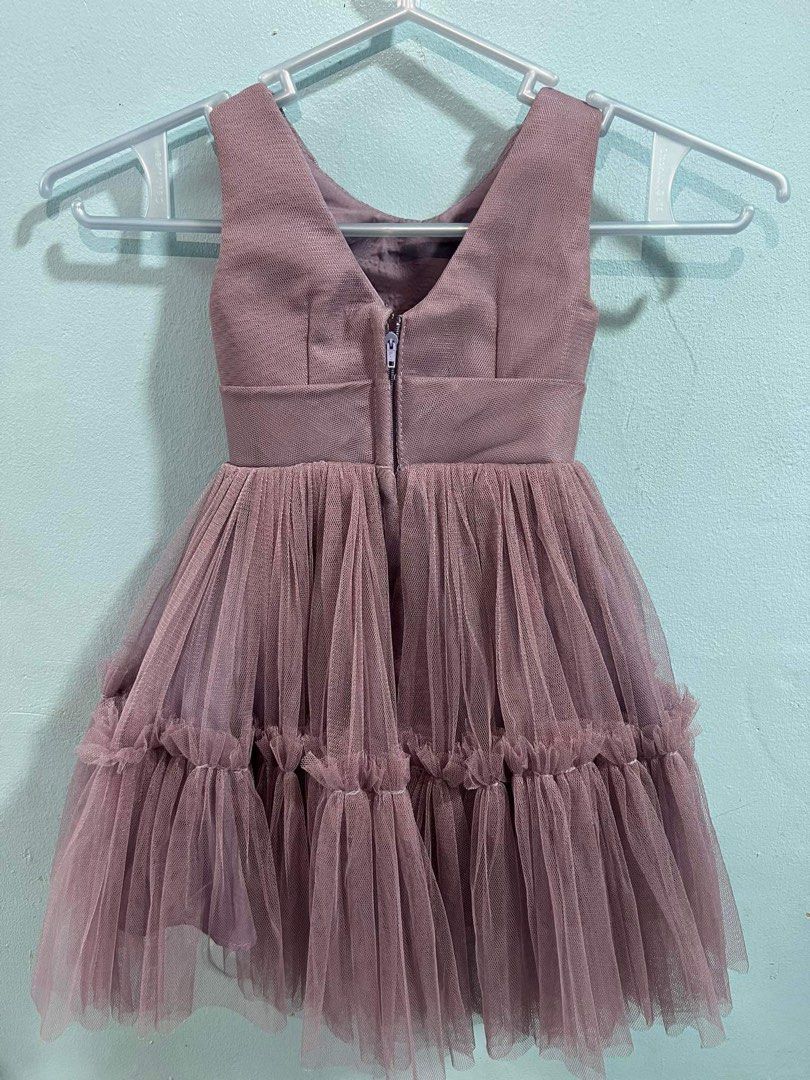 Baby Dress (Category: Babies & Kids Fashion) located in Quezon City. Submitted by dnssld (Listing ID 1322277777, Image 2). Description: Flower girl dress Worn by an 11mos old baby (See photos and details for actual measurement) Color: Purple Mauve w/ ruffle design on skirt w/ attached petticoat Size: Bust - 22cm Waist - 20.5cm Length - 50 cm Bought for 2800 Selling at 900 Location: Quezon City.