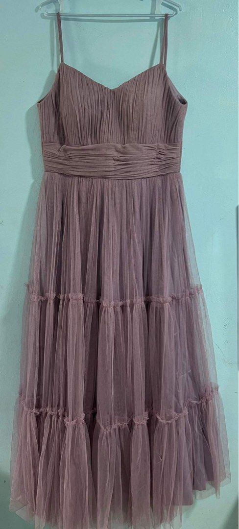 Bridesmaid Dress (Category: Dresses) located in Quezon City. Submitted by dnssld (Listing ID 1322279127, Image 1). Description: Bridesmaid dress Color: Purple Mauve Size: Bust 39 inches Waist 34 inches Length 58 inches Fabric: Canadian Tulle Padded w/ Ruffle design on skirt w/ 1 pocket Location: Quezon City .